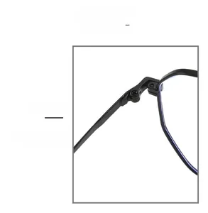 Close-up of durable black metal alloy hinges on minimalist polygonal glasses frames
