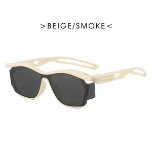 Futuristic Y2K punk sunglasses in beige frame with smoke lenses and hollowed temple design