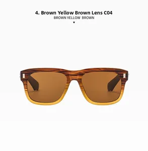 Close-up of retro sunglasses with brown and yellow gradient frame and wooden texture