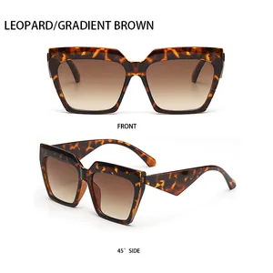 Detailed front and side view of leopard print cat-eye sunglasses with gradient brown lenses