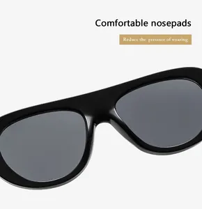 Close-up of integrated smooth nose pads on black vintage aviator sunglasses for comfort