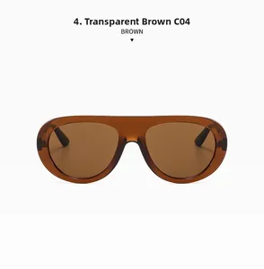 Detail view of transparent brown C04 oversized aviator sunglasses with brown lenses