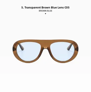 Detail view of C05 vintage sunglasses with transparent brown frame and blue lenses
