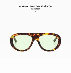 Close-up of retro tortoiseshell frame sunglasses with vibrant light green lenses