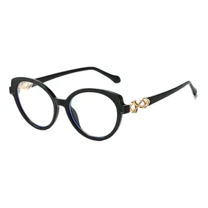 Fashionable black round sunglasses with gold woven metal decor and clear lenses