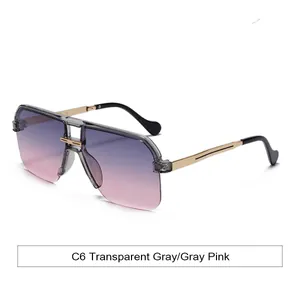 Chique halfrand oversized zonnebril met roze gradiëntglazen en gouden metalen pootjes