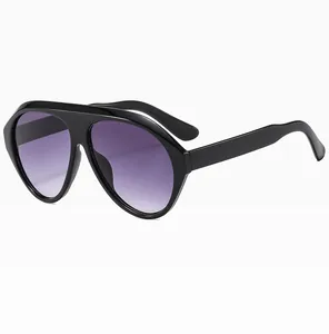 Side view of oversized black pilot sunglasses featuring purple gradient lenses on white