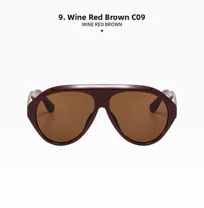 Detail view of oversized wine red resin sunglasses with brown lenses and C09 model mark