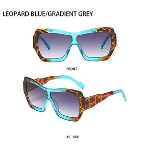 Détails de lunettes de soleil oversize léopard et bleu avec verres gris dégradés