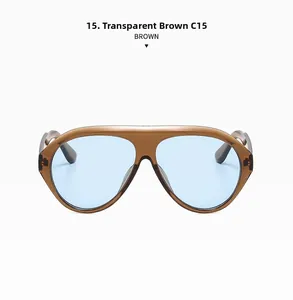 Detail of transparent tea brown frame sunglasses with light blue lenses and bridge