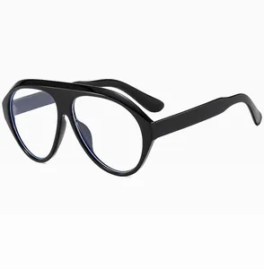 Detail view of large-frame fashion sunglasses showing smooth black finish and blue light coating