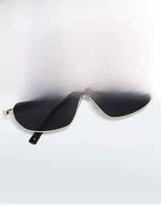 Detail of irregular metal frame sunglasses with double bridge and dark lenses