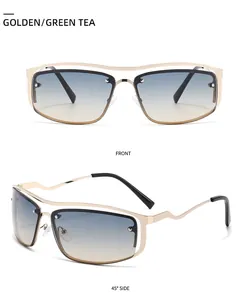 Détails des lunettes de soleil carrées dorées avec double pont ajouré et verres dégradés