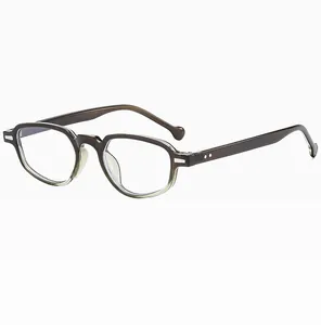 Detail view of retro cat-eye glasses frame with keyhole bridge and metallic silver accents