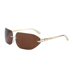 Lunettes de soleil sans monture vintage avec verres dégradés et branches dorées serpent