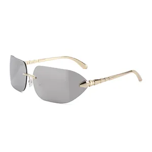 Lunettes de soleil sans monture rétro avec verres gris foncé et branches serpent dorées