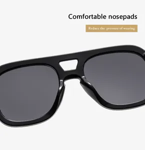 Close-up of comfortable integrated nose pads on black double-bridge sunglasses