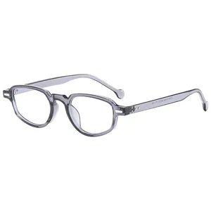 Retro grey semi-transparent cat-eye sunglasses with silver rivets and sleek frame