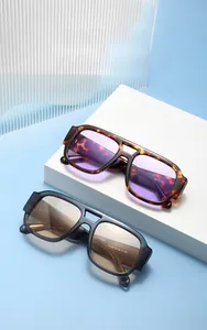 Detail view of double bridge retro sunglasses with 54-19-145 size specs on temple