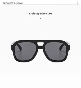 Detail of bright black pilot sunglasses showing metal nose bridge and sturdy hinges