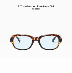 Close-up of retro demi tortoise shell frames with stylish light blue tinted lenses