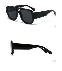 Detail view of black chunky square sunglasses with double bridge and thick temples