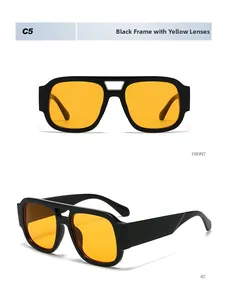 Macro detail of retro double-bridge sunglasses with black frames and yellow lenses