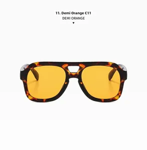 Front view of demi tortoise double bridge sunglasses with bright orange lenses C11