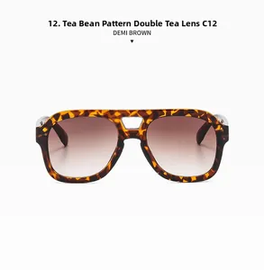 Front view of aviator style sunglasses with demi brown frames and tea gradient lenses