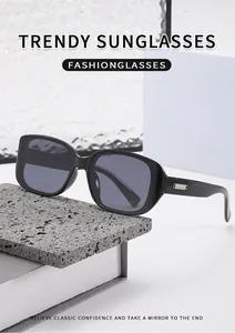Detailed macro view of matte black square frames with silver metal side accents