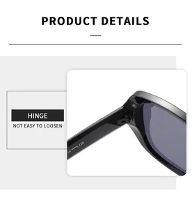 Detail of durable hinge structure on black vintage sunglasses with size specs