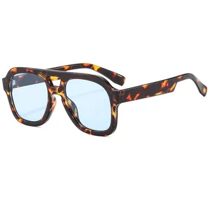 Fashionable double-bridge aviator sunglasses with tortoiseshell frame and blue lenses