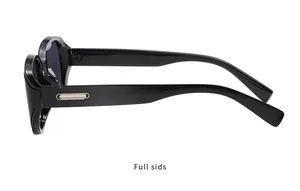Side view detail of black oversized sunglasses with a silver metal paperclip hinge