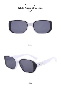 Detail view of retro white rectangular sunglasses with grey lenses and metal temple accents