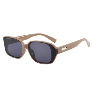 Retro curved khaki frame sunglasses with dark grey lenses and silver metal temple detail