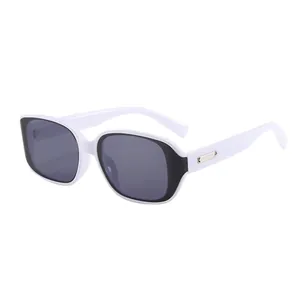 Vintage square sunglasses in bold black and white contrast with protective UV lenses
