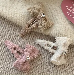 Set van 3 tweed strik haarclips met hartvormige strass steentjes en zachte textuur