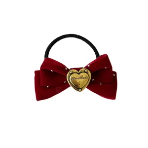 Elegante elastico per capelli con fiocco di velluto rosso e cuore in metallo