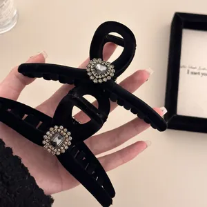 Elegant black flocked hair claw clips with sparkling heart and square shaped rhinestones