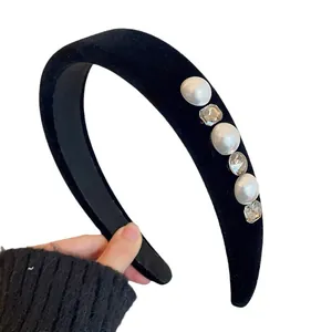 Elegant vintage black velvet headband with pearls and rhinestones for classic hair styling