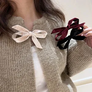 Elegant velvet bow hair clip set in beige, burgundy, and black for women’s hair styling