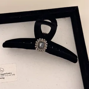 Elegant black velvet shark clip hair claw with rectangular crystal and diamond accents
