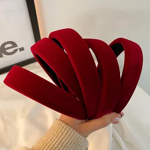 Elegant wide velvet padded headband in wine red finish for a classic vintage look