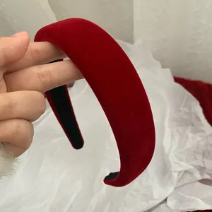 Close-up of the plush dark red velvet texture on this vintage thick padded headband