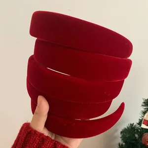 Detailed view of plush burgundy velvet padded headband for retro autumn winter styling