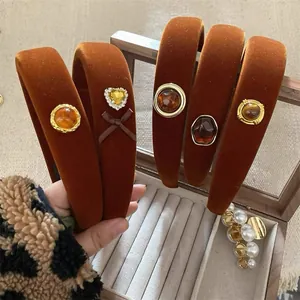 Five-piece velvet headband set in caramel brown with retro gemstone and bow accents