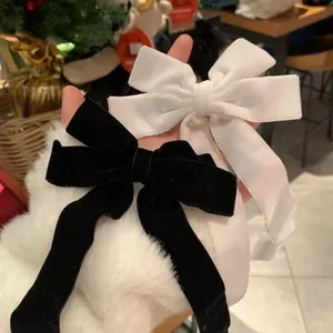 Barrettes à nœuds en velours noir et blanc avec longs rubans pour un style polyvalent