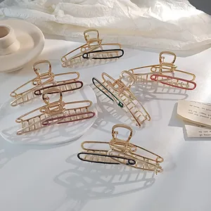 Elegante goudkleurige haarklemmen met kleurrijke emaille accenten in diverse tinten