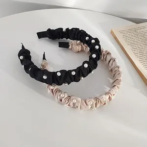 Serre-tête noué élégant avec perles en satin de couleur noir et champagne