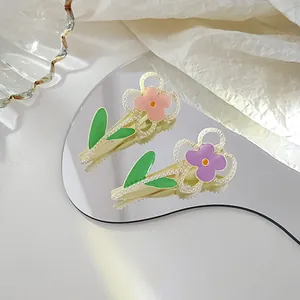 Pastel flower duckbill hair clips with pearls in pink and purple colors for girls
